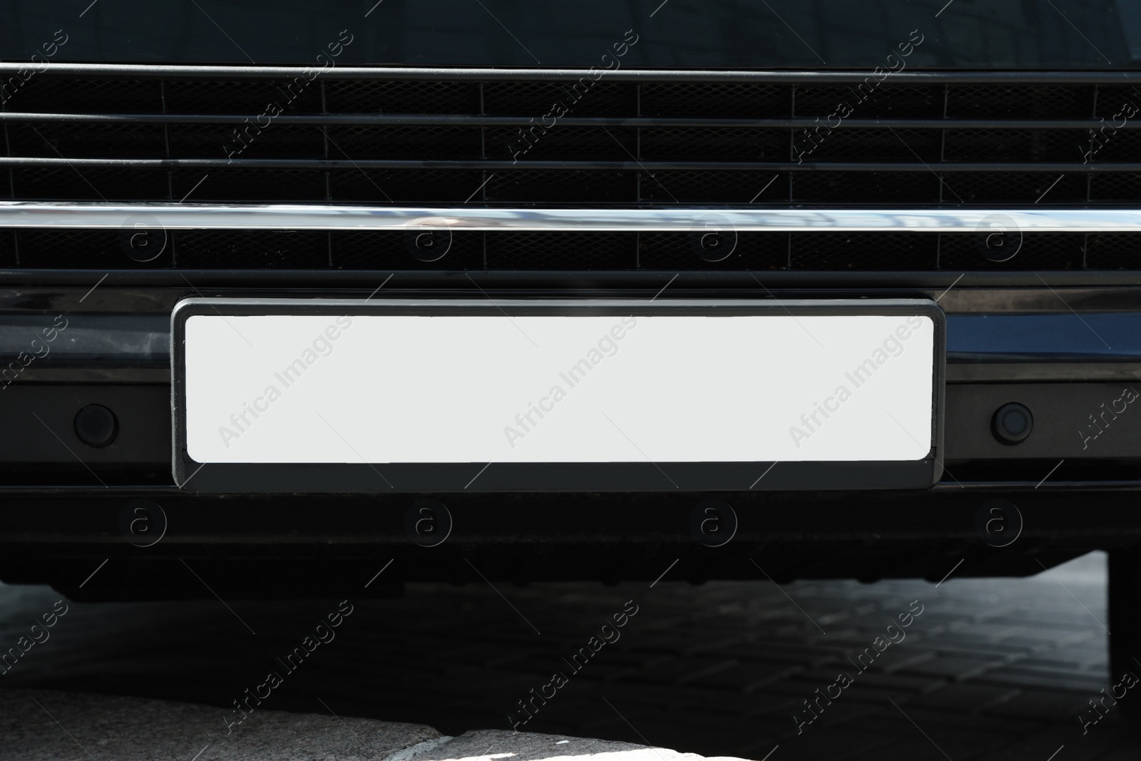 Photo of Car with vehicle registration plate outdoors, closeup