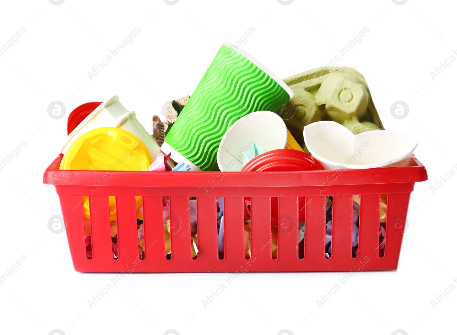 Photo of Crate with cardboard and plastic garbage on white background. Trash recycling