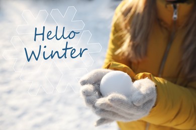 Image of Hello Winter. Woman holding snowball outdoors on sunny day, closeup 