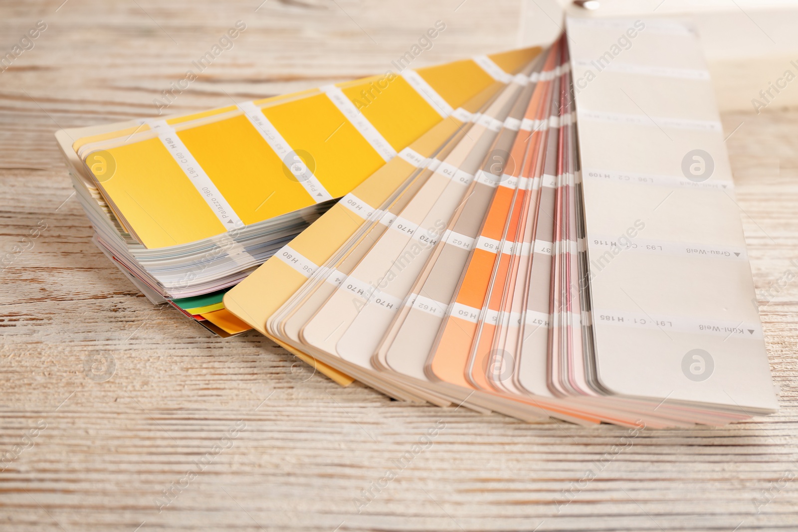 Photo of Color palette samples on wooden background