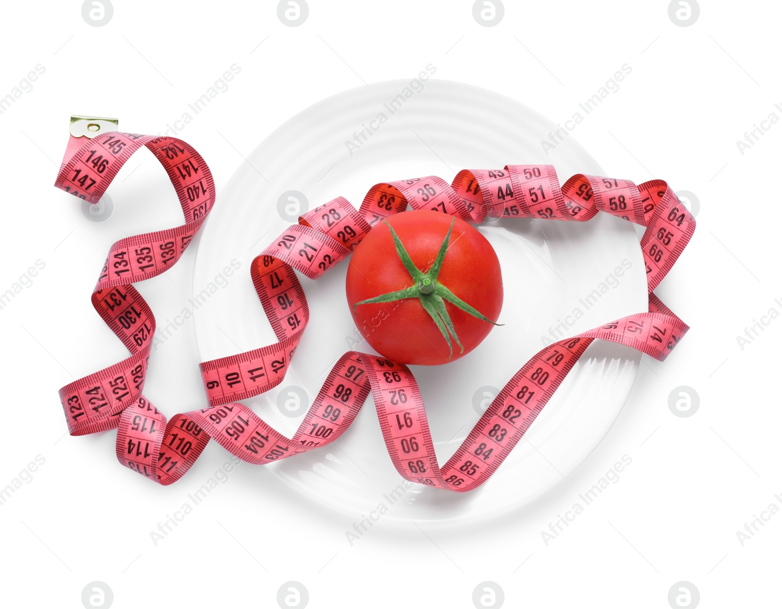 Photo of Measuring tape, plate and fresh tomato isolated on white, top view. Diet concept