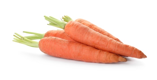 Photo of Fresh ripe carrots on white background. Wholesome vegetable