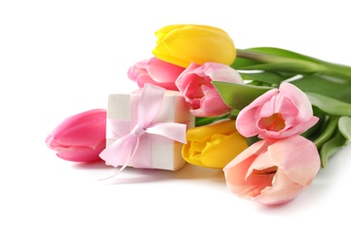 Photo of Beautiful spring tulips and gift box on white background. International Women's Day