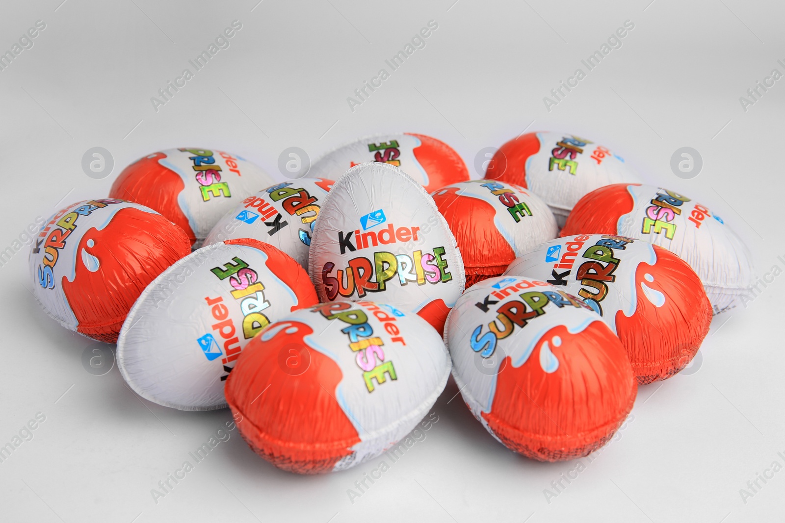 Photo of Sveti Vlas, Bulgaria - June 26, 2023: Kinder Surprise Eggs on white background, closeup