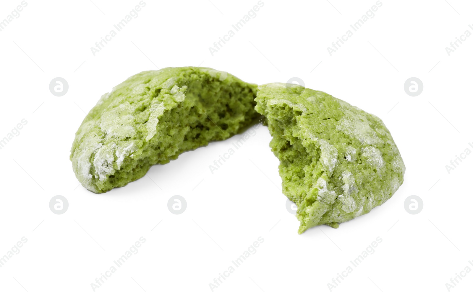 Photo of Halves of tasty matcha cookie isolated on white