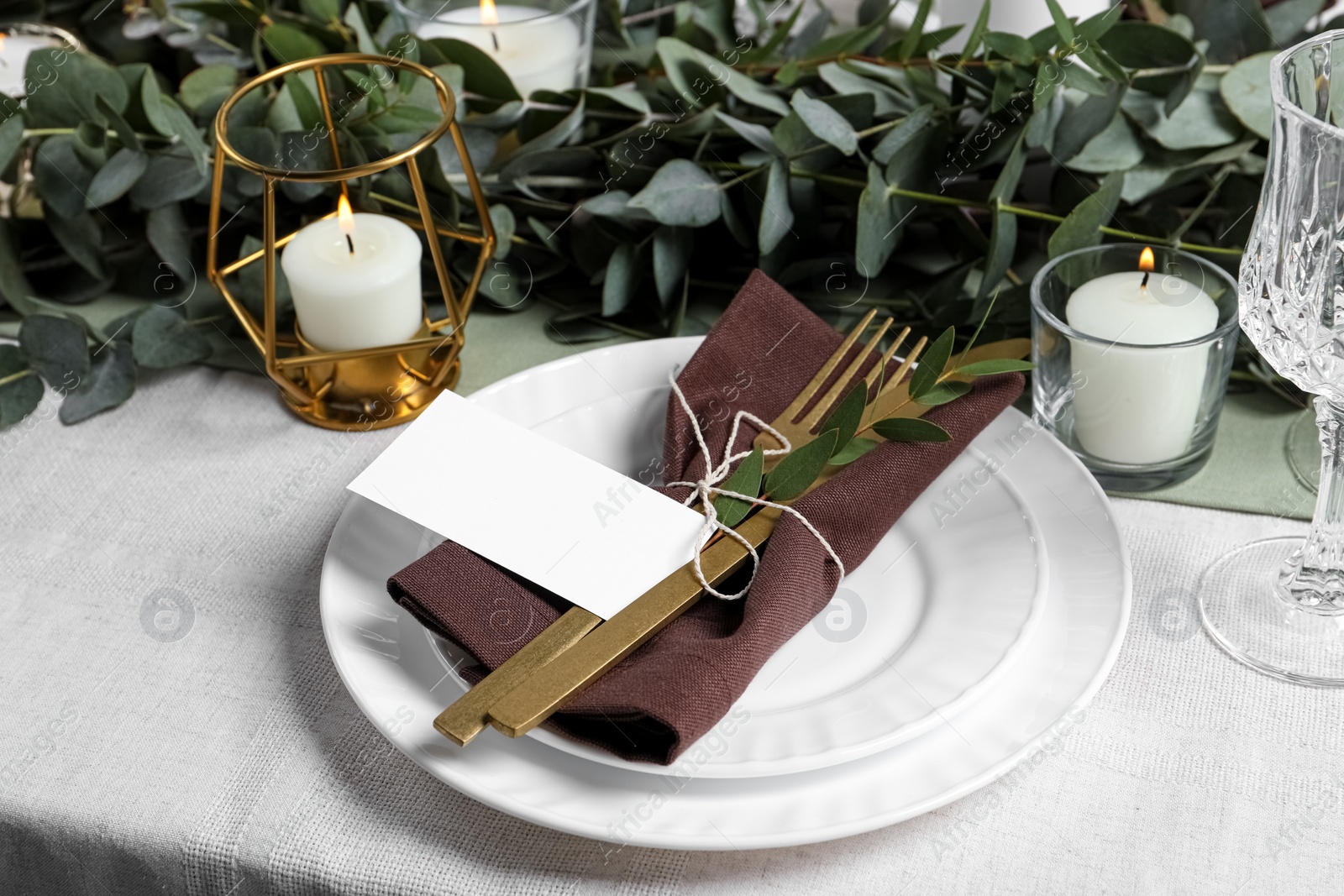 Photo of Luxury table setting with beautiful decor and blank card. Festive dinner