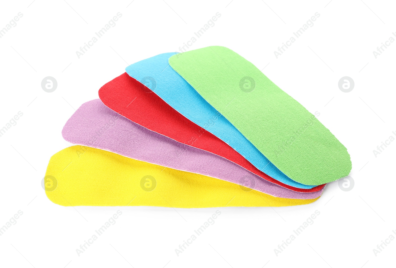 Photo of Bright kinesio tape pieces on white background