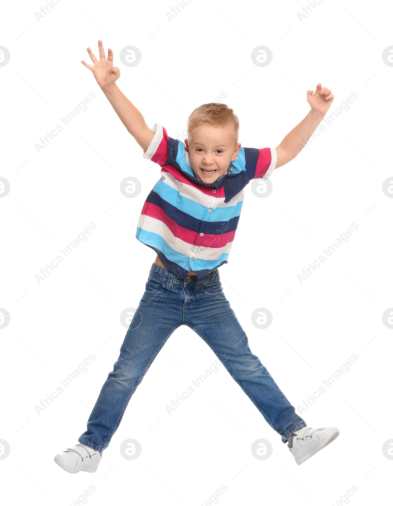 Photo of Cute little boy jumping on white background