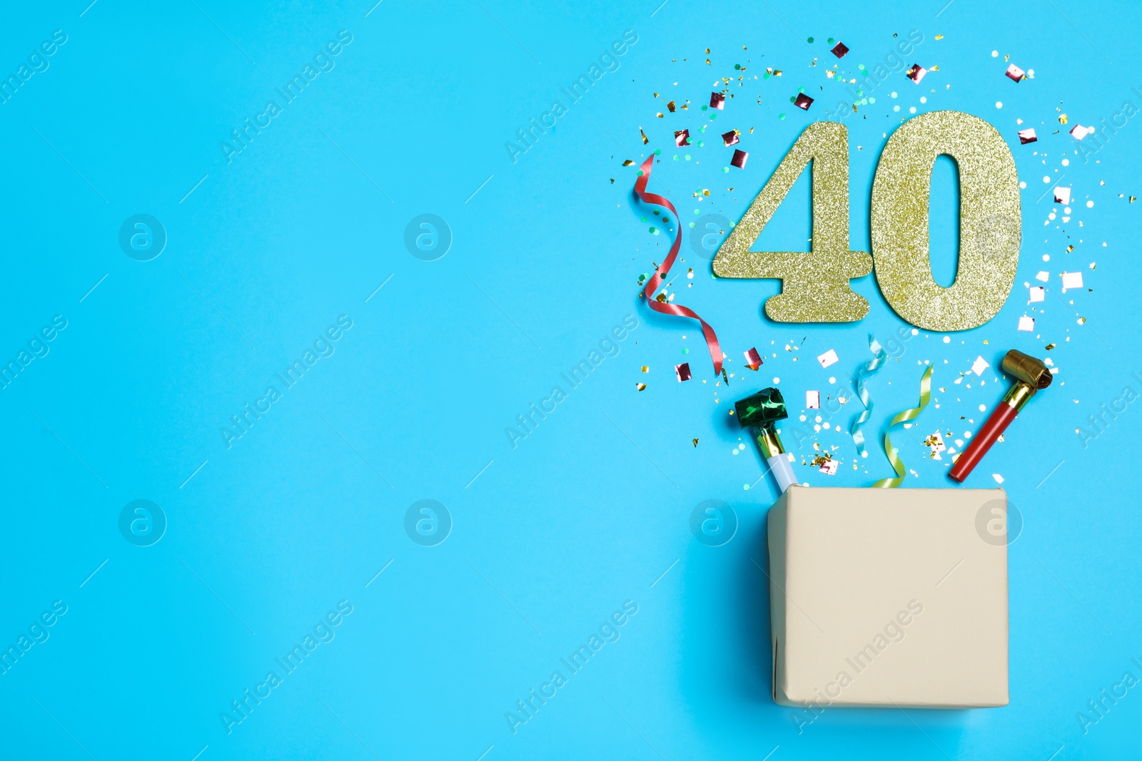 Photo of Flat lay composition with decor and numbers on light blue background, space for text. 40th birthday party
