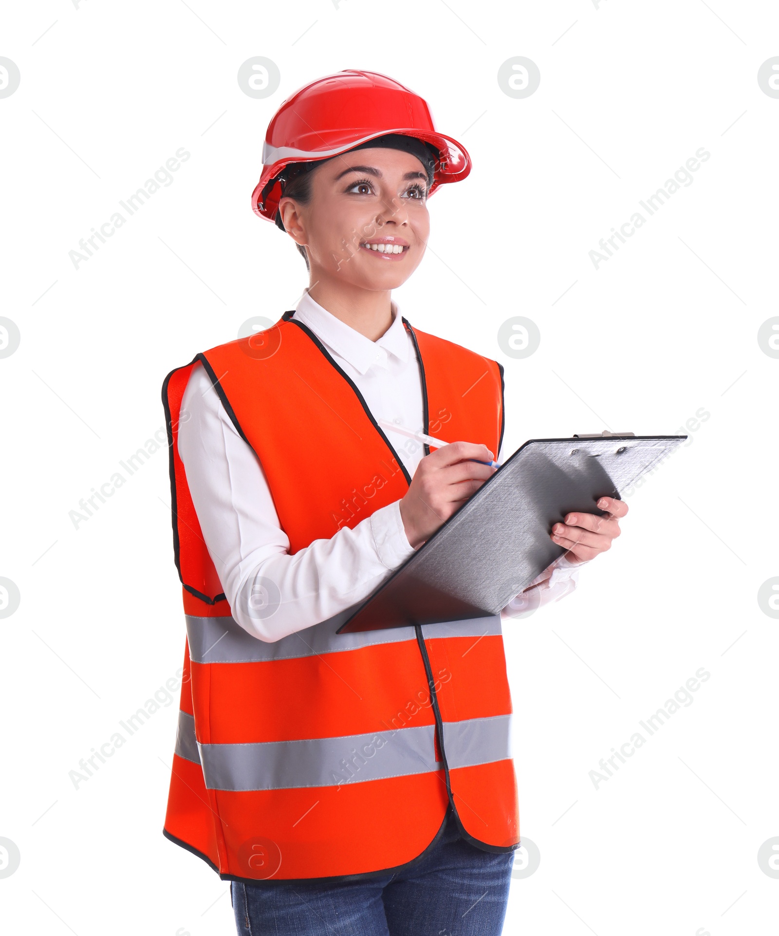 Photo of Female industrial engineer in uniform with clipboard on white background. Safety equipment