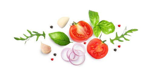 Image of Fresh ripe tomatoes with garlic, onion, basil, arugula and peppercorns on white background. Banner design