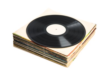 Photo of Stack of vintage vinyl records on white background