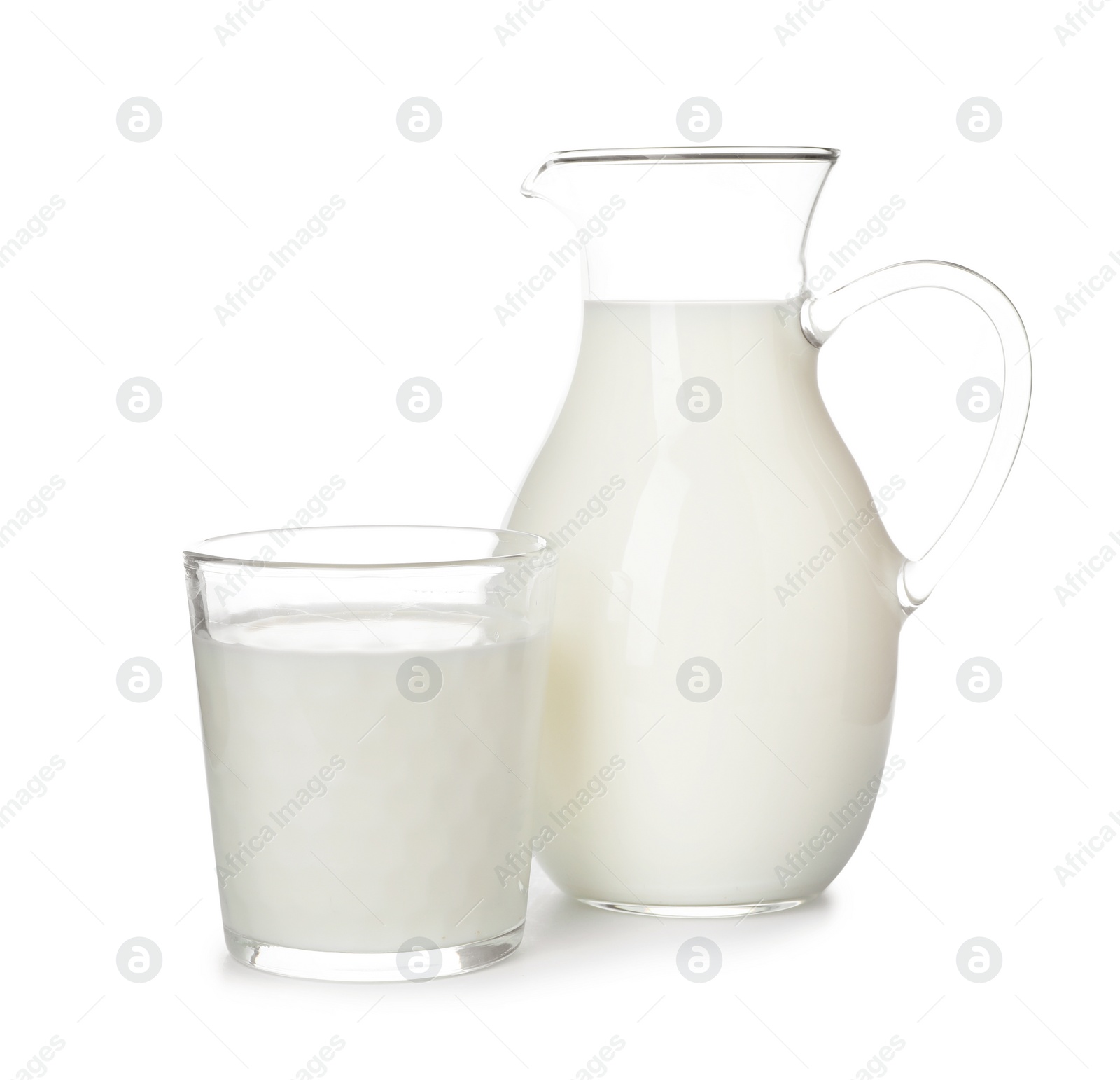 Photo of Glass and jug with fresh milk on white background