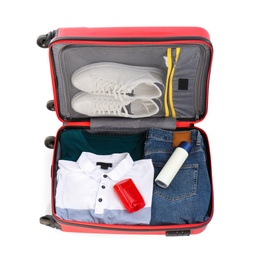 Packed suitcase with deodorants and clothes on white background