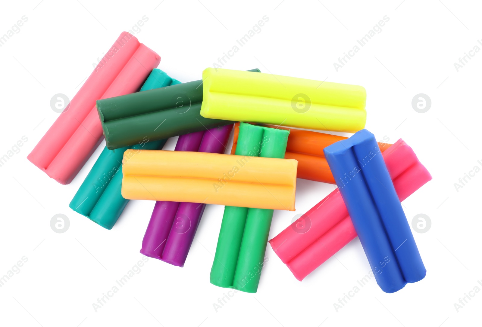 Photo of Many different colorful plasticine pieces on white background, top view