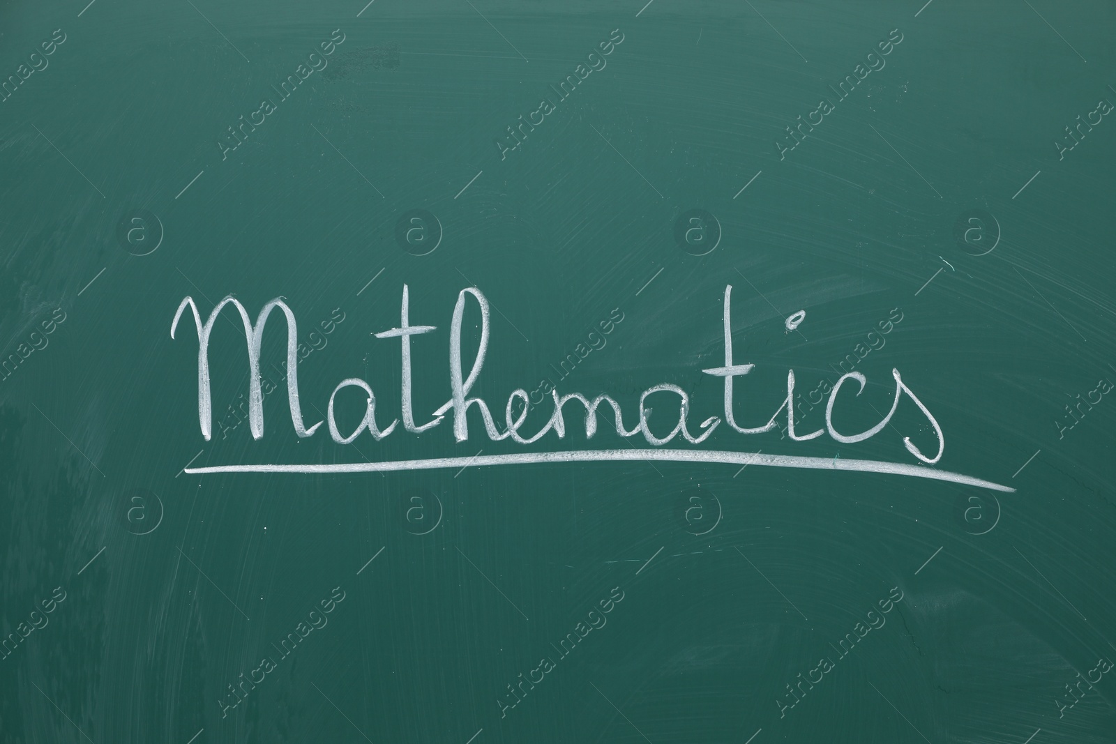 Photo of Word Mathematics written with chalk on green board