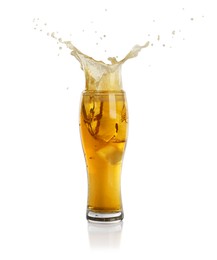 Beer splashing out of glass on white background