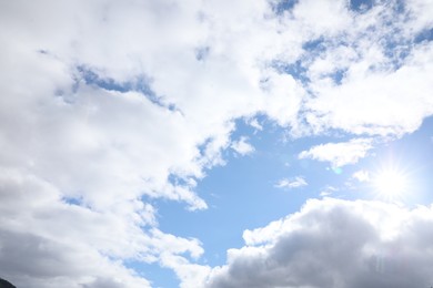 View of beautiful blue sky with white fluffy clouds