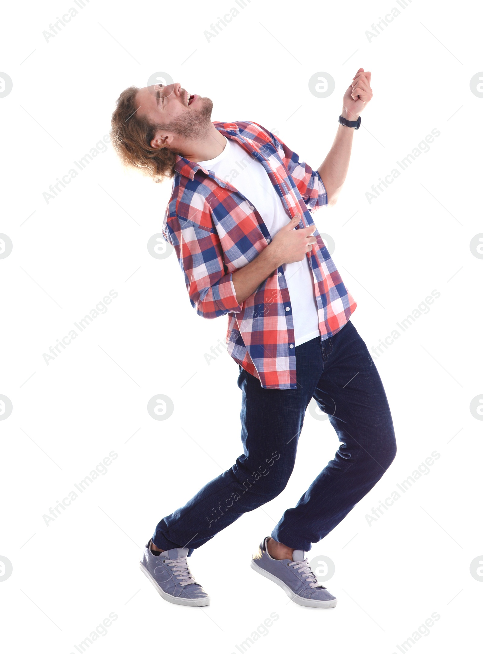 Photo of Young man playing air guitar on white background