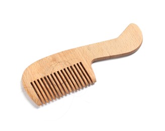 Photo of Wooden comb with lost hair isolated on white, above view