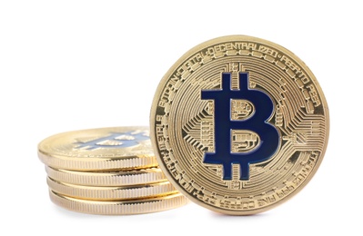 Photo of Shiny bitcoins isolated on white. Digital currency