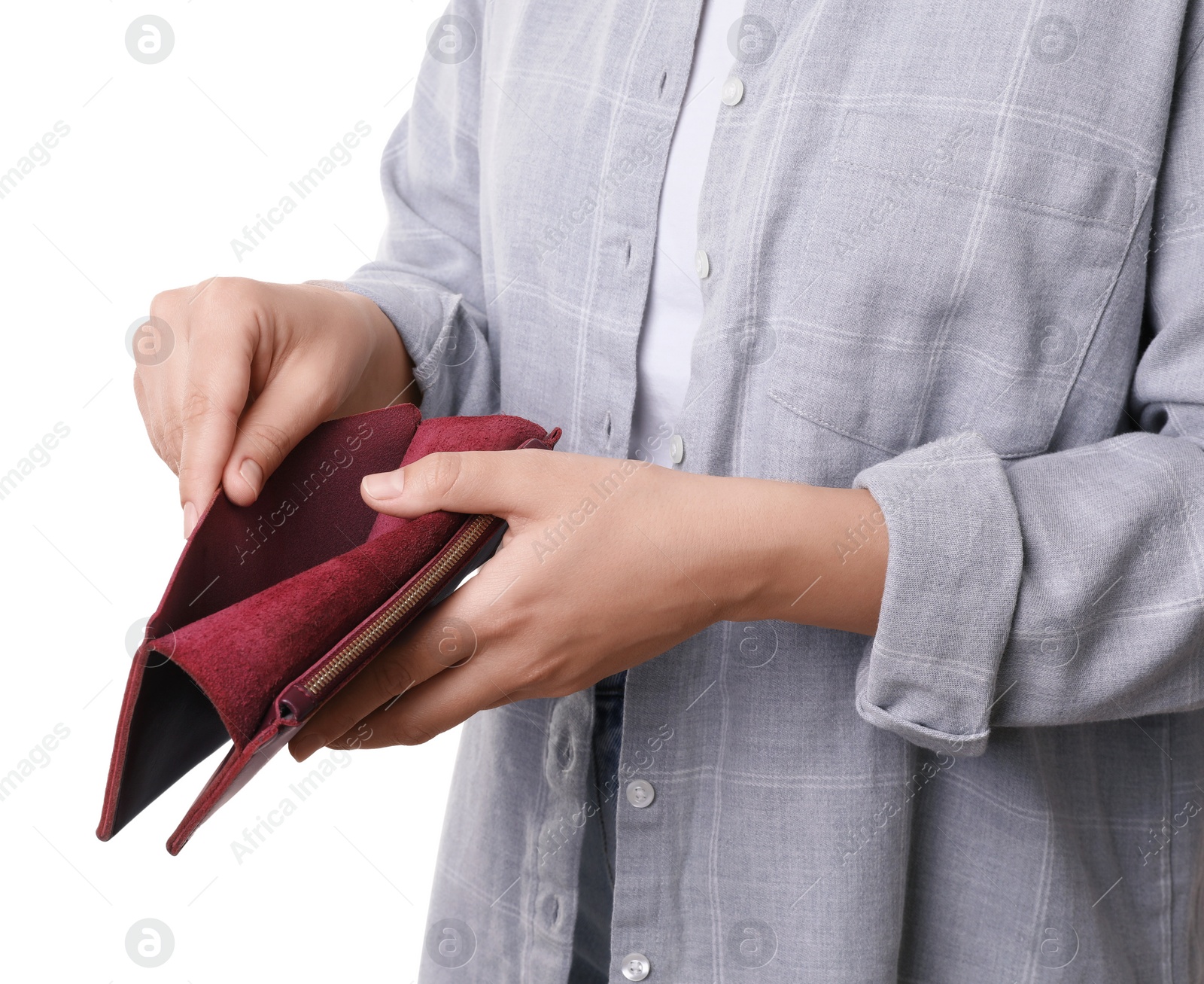 Photo of Poor woman with empty wallet on white background, closeup