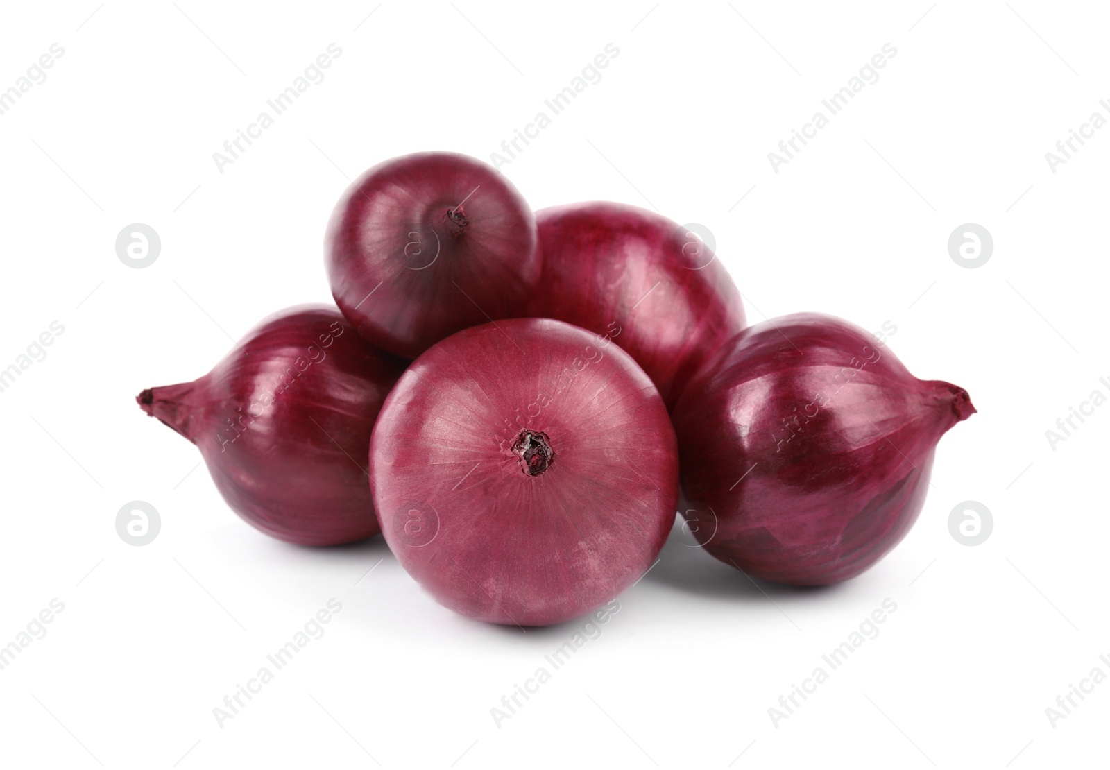 Photo of Fresh whole red onions on white background