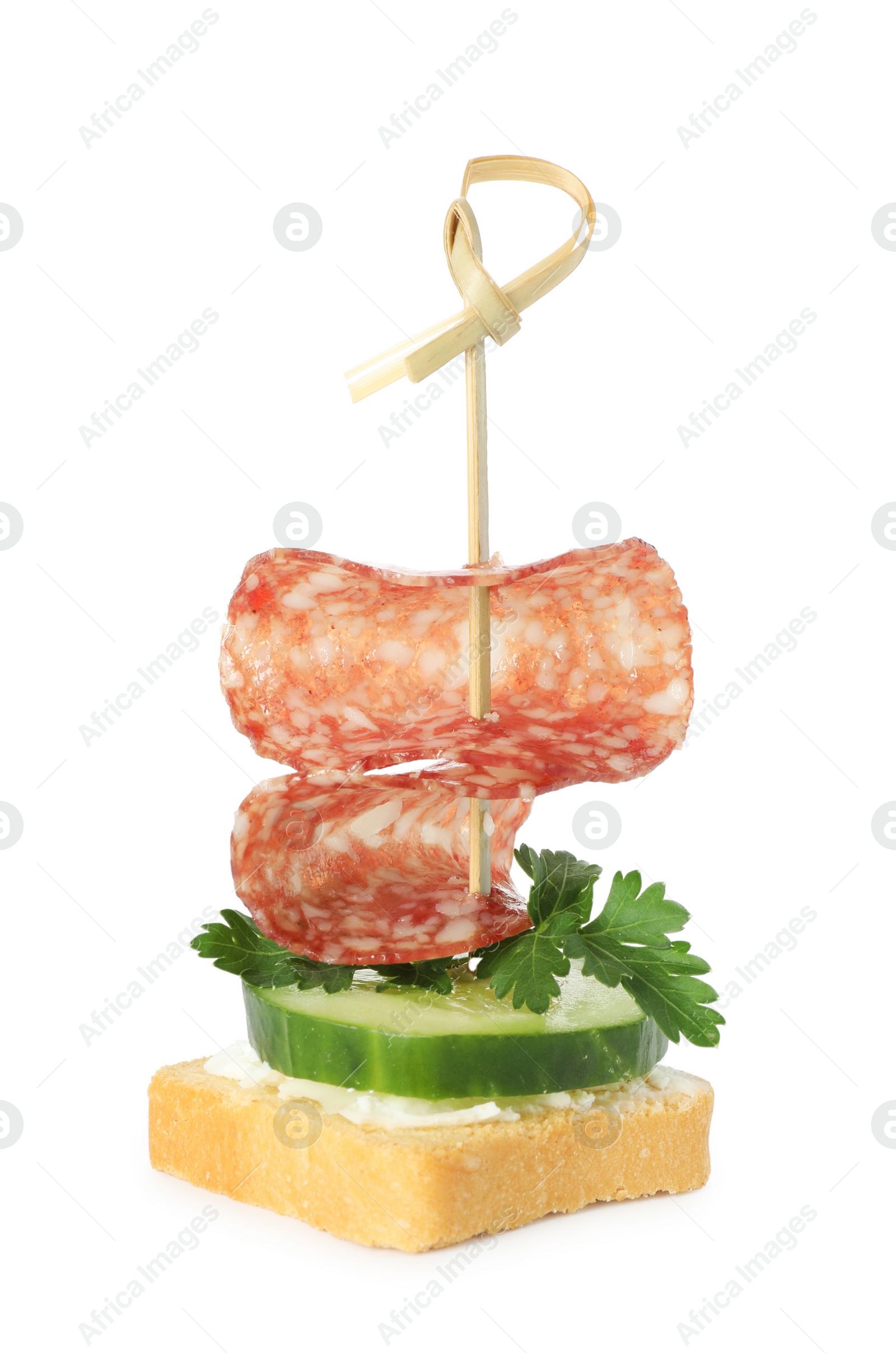 Photo of Tasty canape with salami, cucumber and cream cheese isolated on white