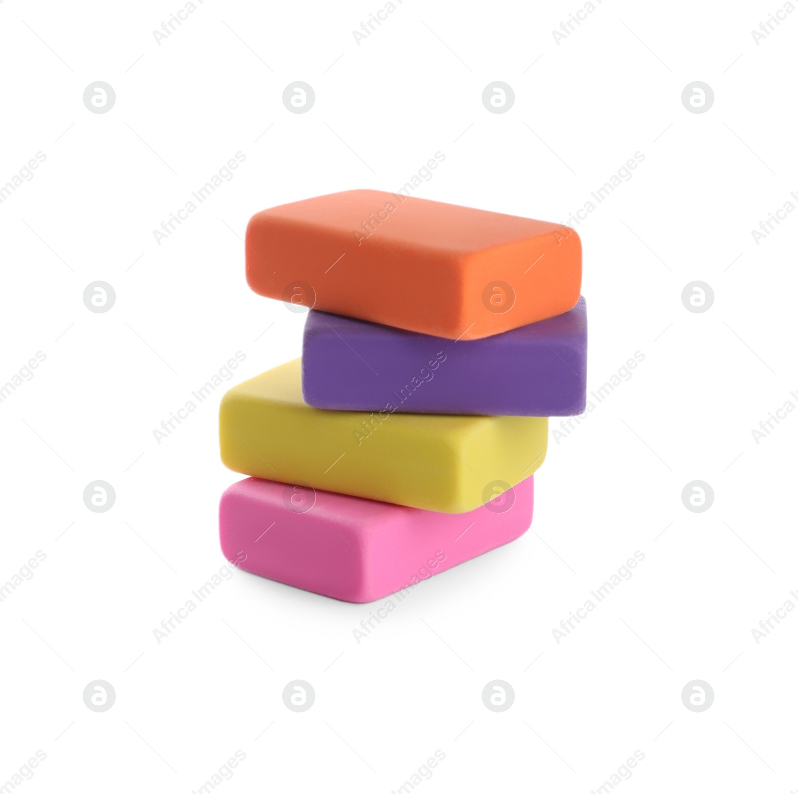 Photo of Stack of bright erasers on white background