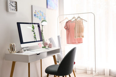 Designer's workplace with modern computer on table