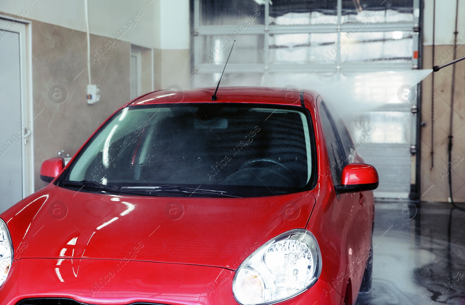 Photo of Clean automobile at professional car wash service