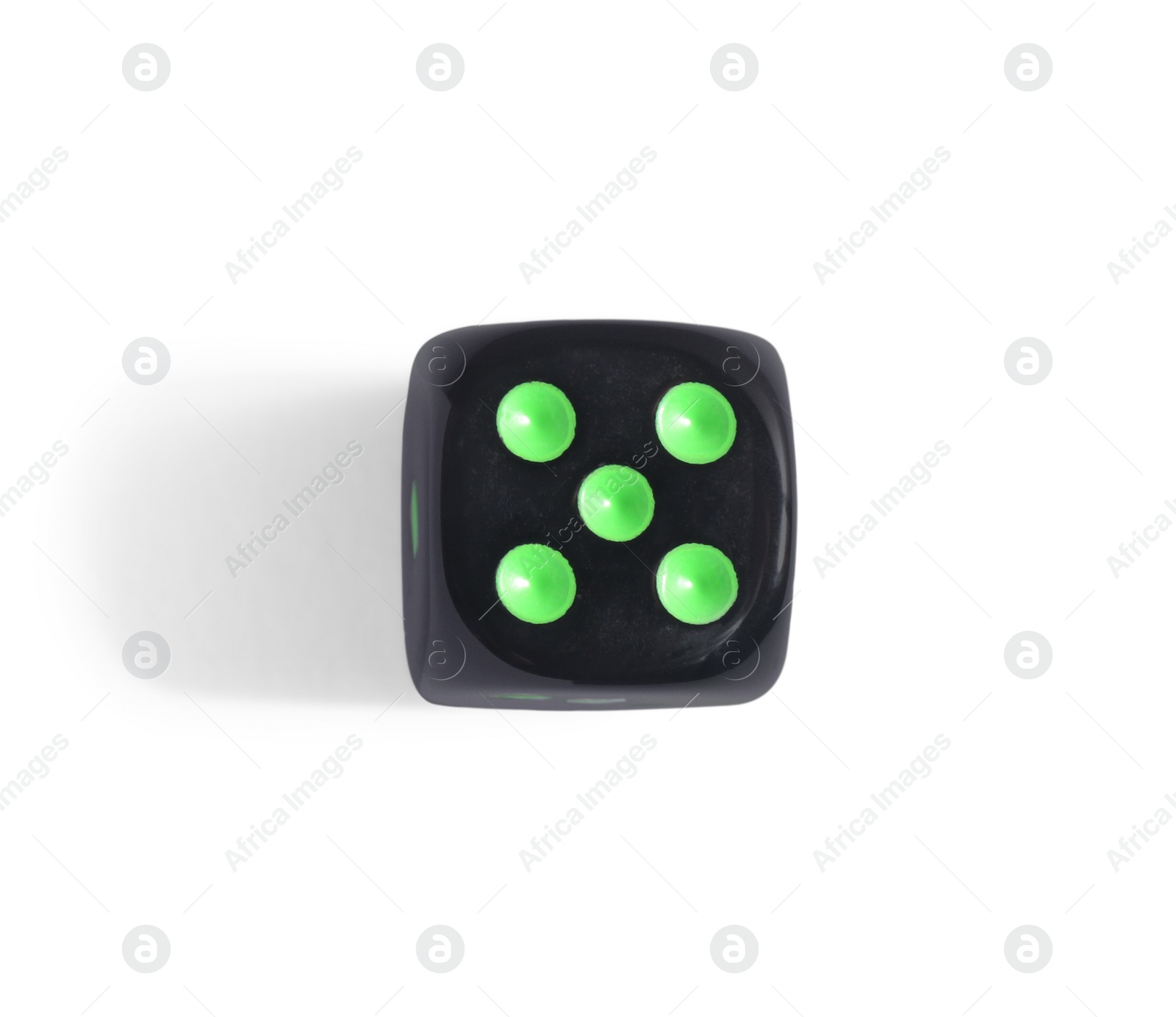 Photo of One black game dice isolated on white, top view