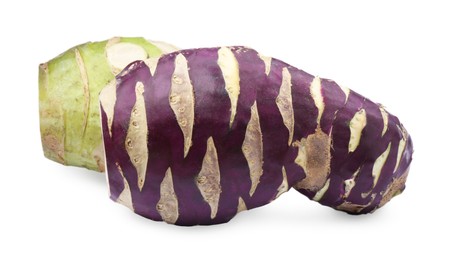 Photo of Tasty purple and green Kohlrabi cabbages on white background