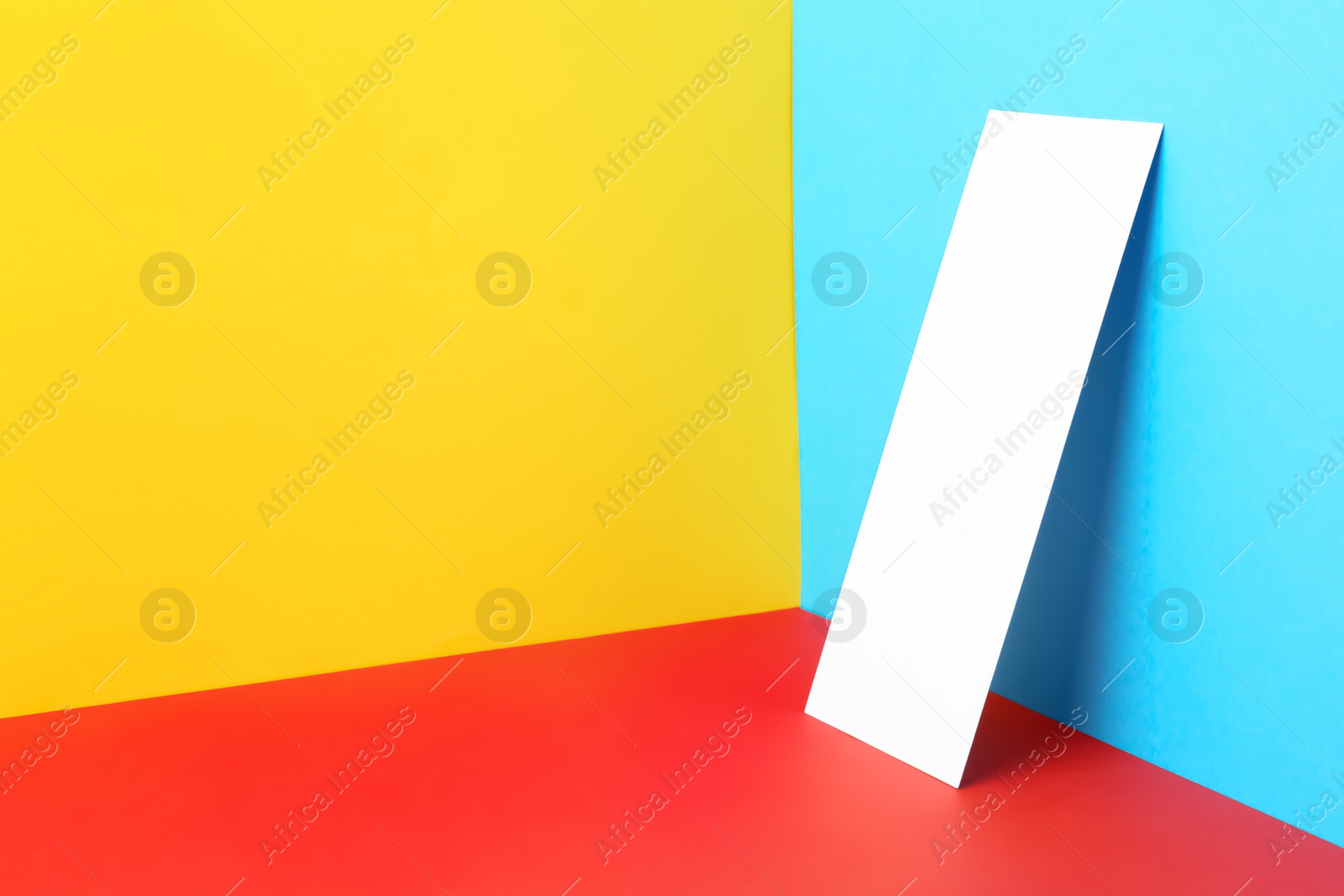 Photo of Empty sheet on color background. Mockup for design