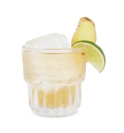 Photo of Glass of tasty ale with ice cube, lime and ginger slices isolated on white