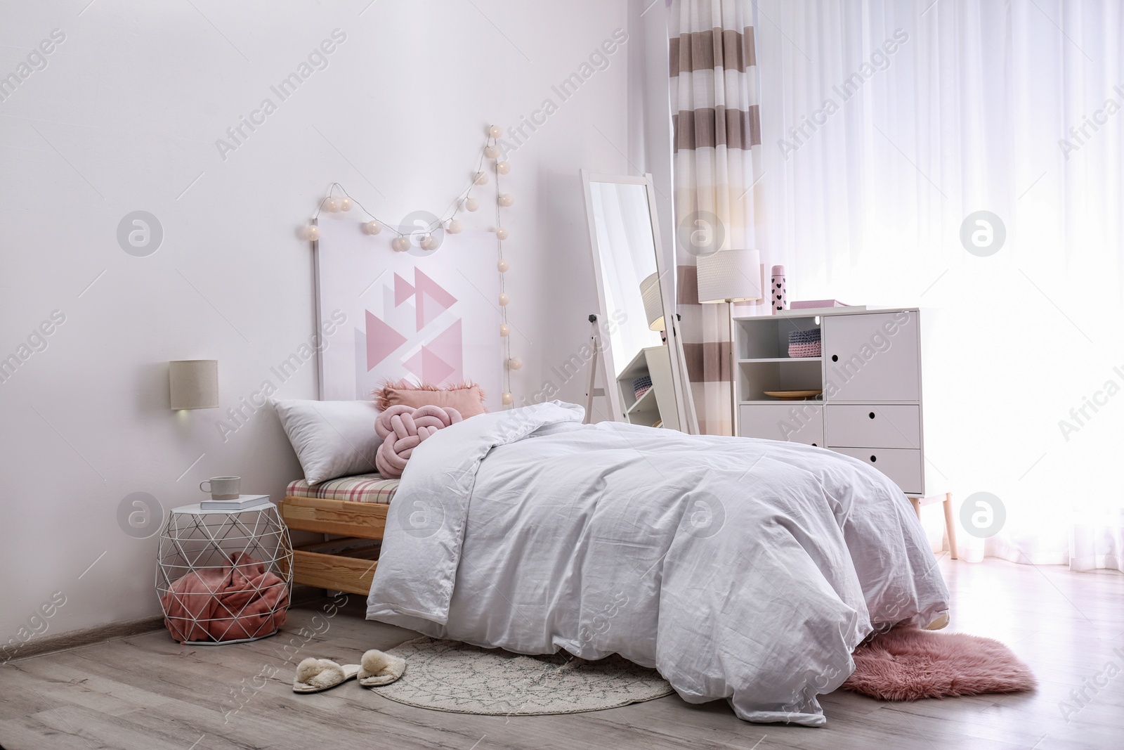 Photo of Modern teenager room interior with comfortable bed