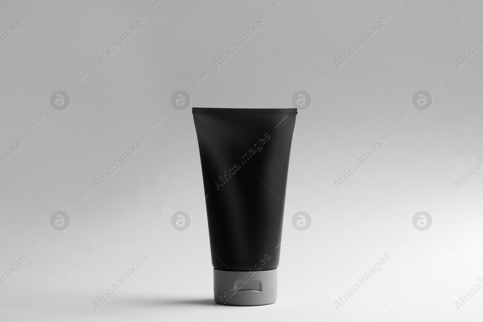 Photo of Men's cosmetic product on light background. Mockup for design