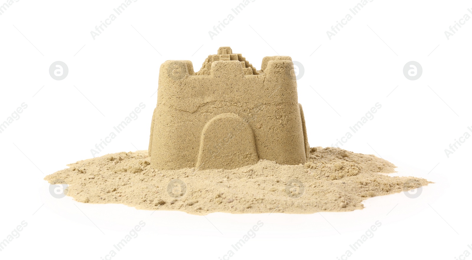 Photo of Pile of sand with beautiful castle isolated on white