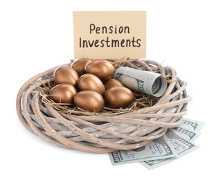Photo of Many golden eggs in nest, money and card with phrase Pension Investments on white background