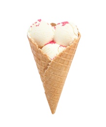Photo of Delicious vanilla ice cream in wafer cone on white background