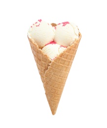 Delicious vanilla ice cream in wafer cone on white background