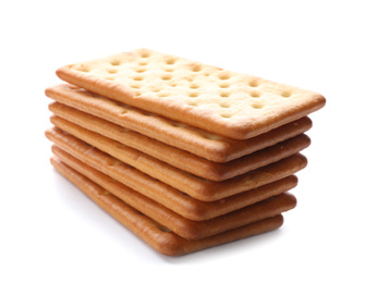 Stack of delicious crispy crackers isolated on white