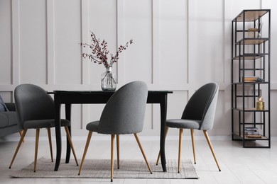 Beautiful dining room interior with new stylish furniture