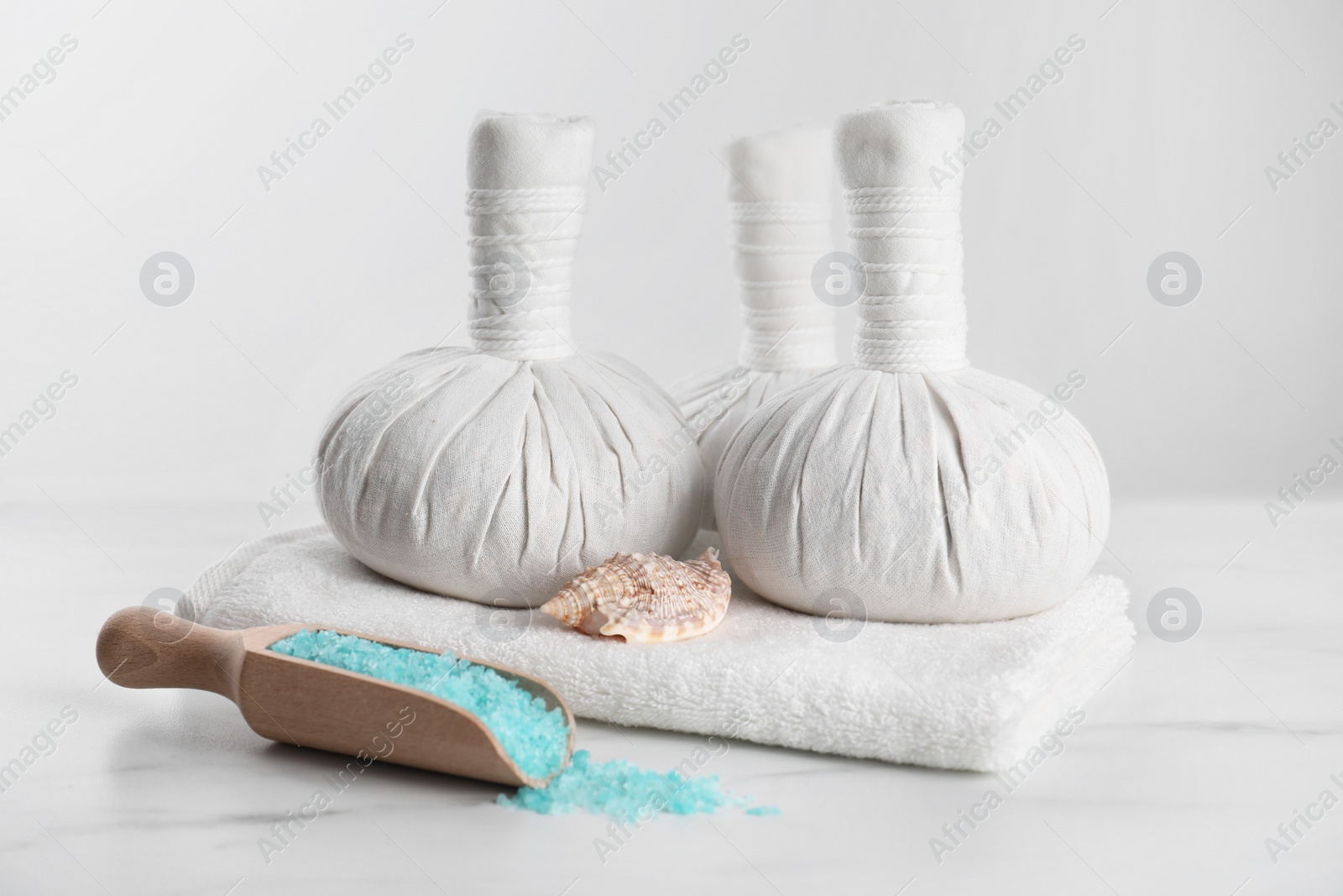 Photo of Spa composition with care products on white marble table