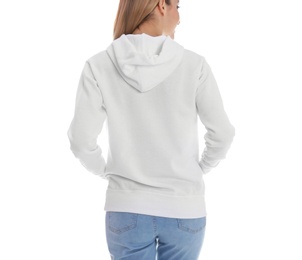 Woman in hoodie sweater on white background. Space for design