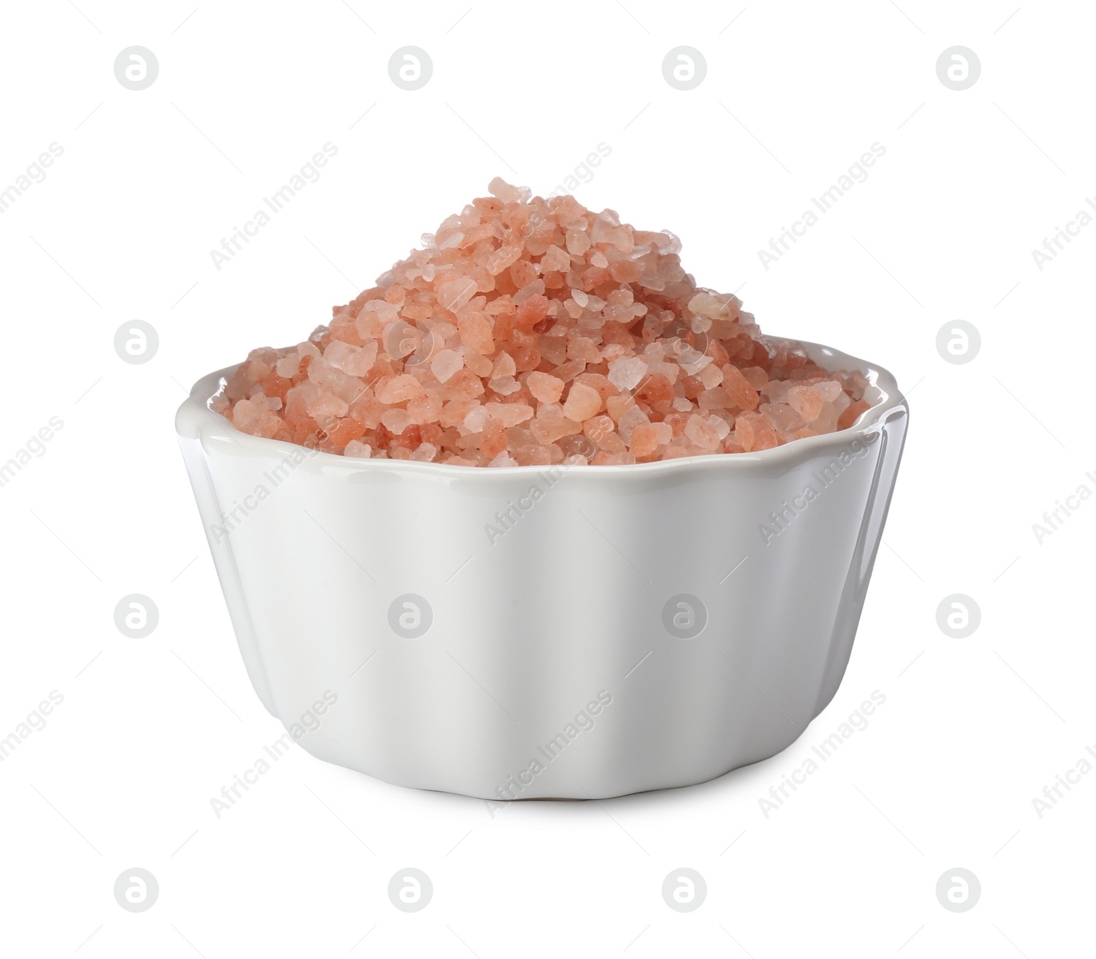 Photo of Pink himalayan salt in bowl isolated on white