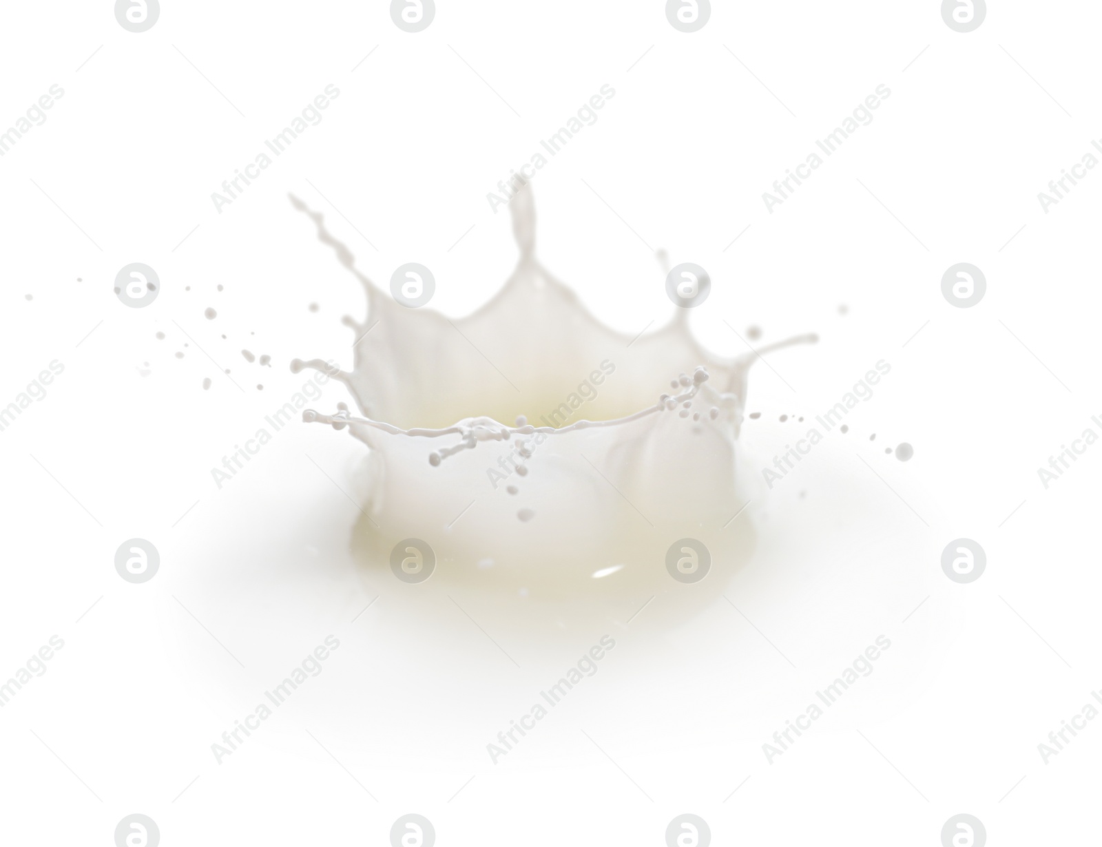 Photo of Splash of fresh milk isolated on white