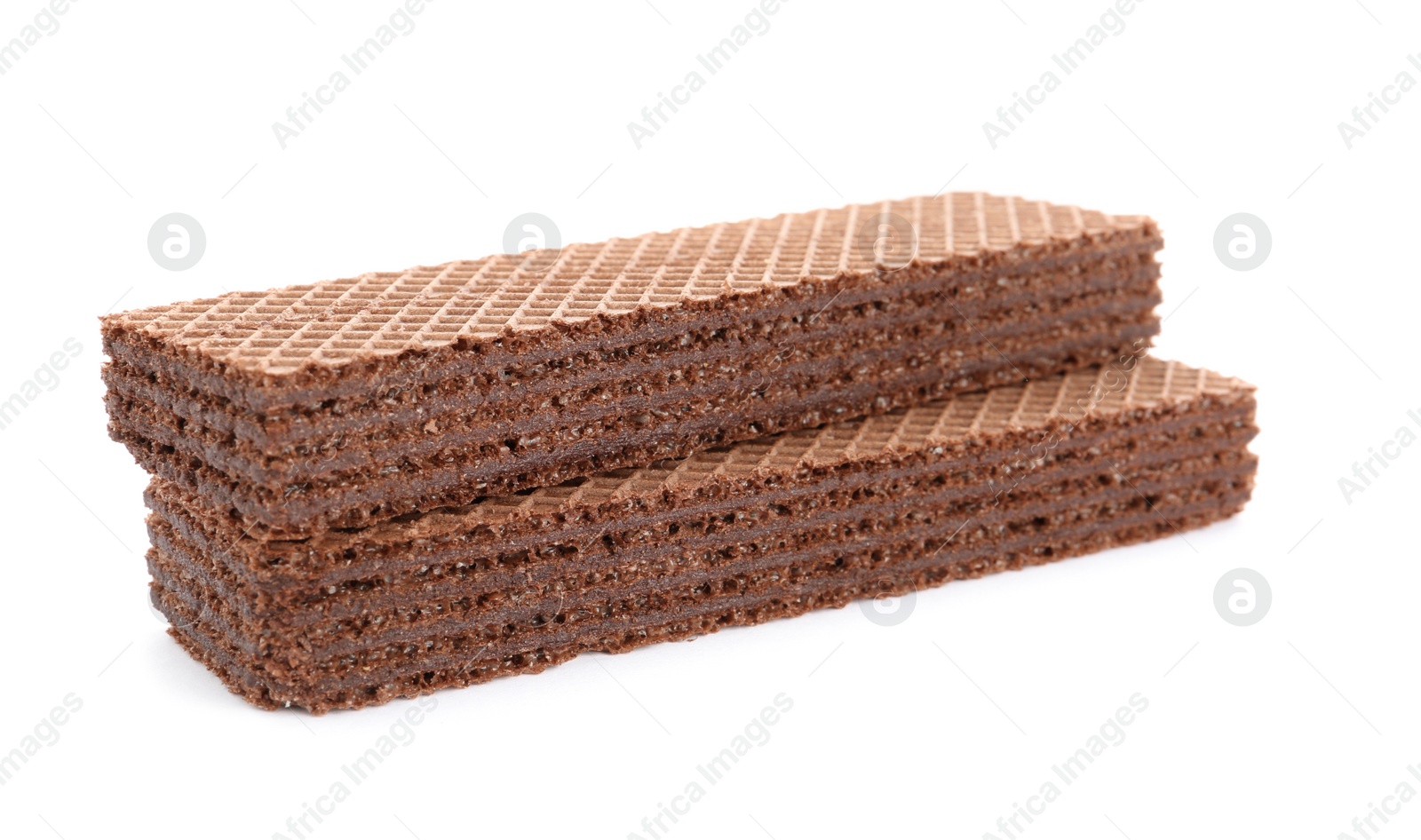 Photo of Delicious crispy wafers on white background. Sweet food