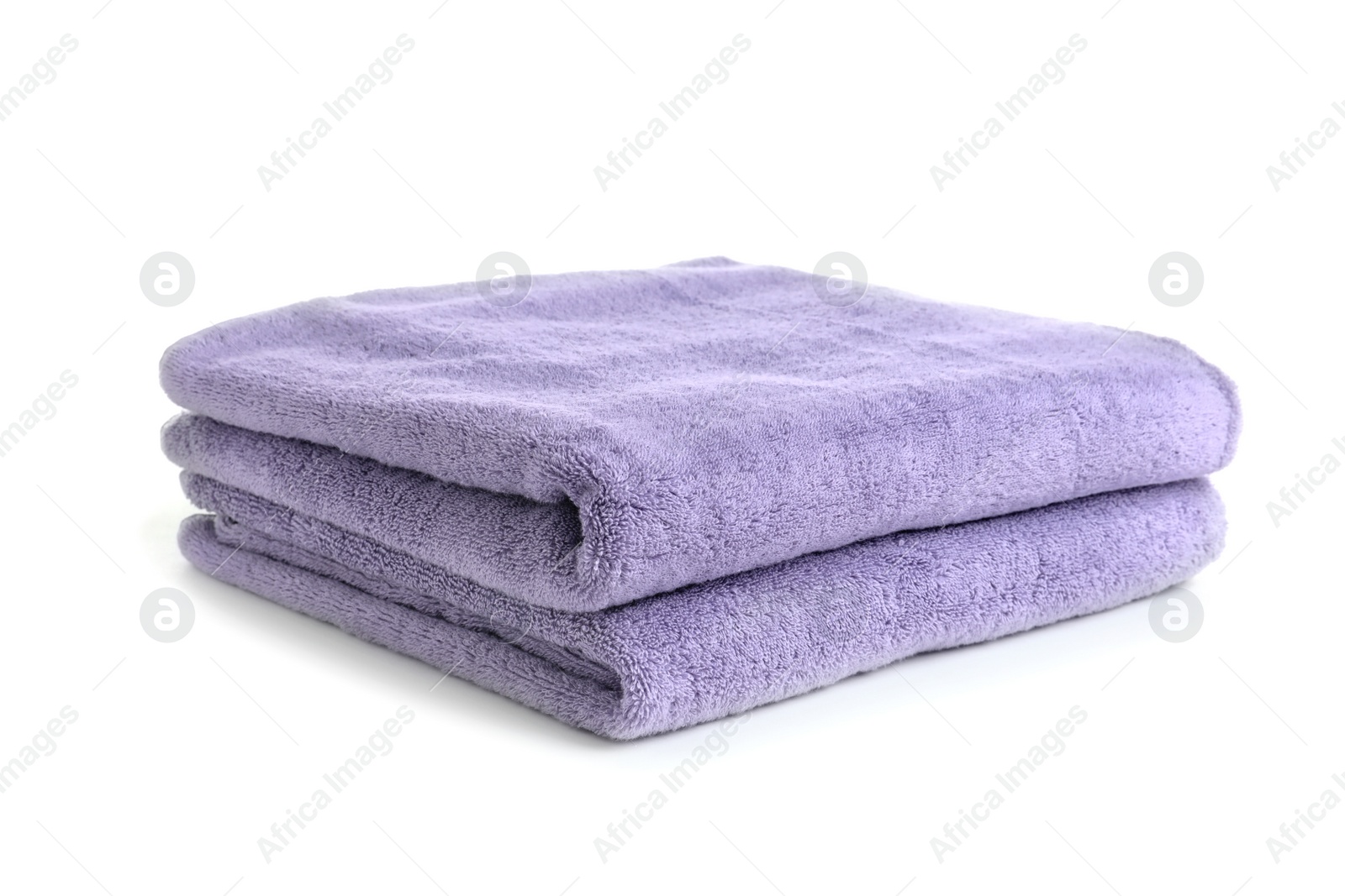 Photo of Folded clean soft towels on white background