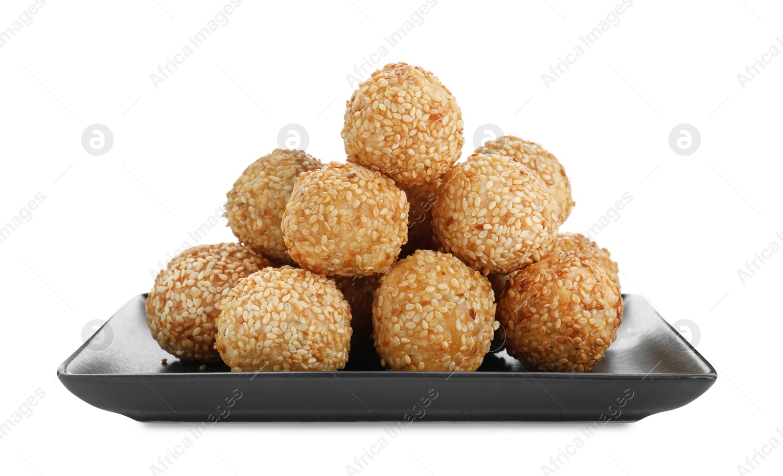 Photo of Many delicious sesame balls on white background